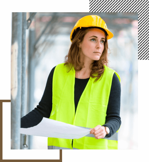 Women with safety vest ad holding paper