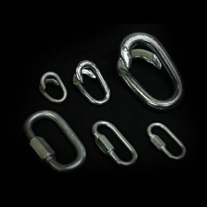 Metal quick links on black background.
